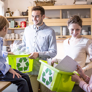 family-at-home-with-waste-boxes